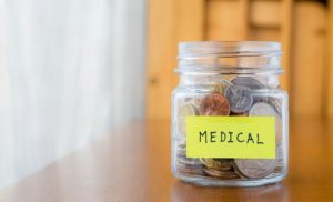 medical expenses jar of coins